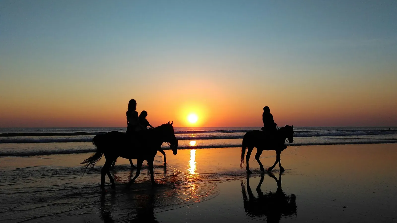 Surfing on Essaouira beach with Atlantic waves