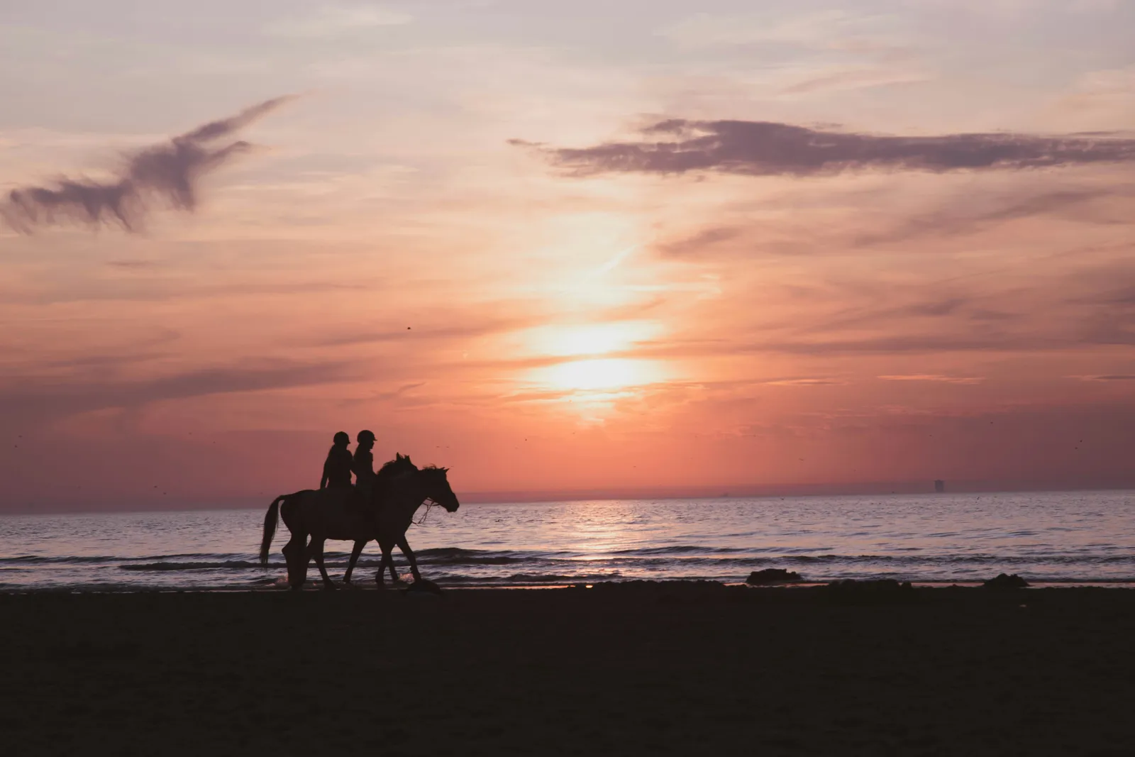 Romantic sunset horse ride for couples on Essaouira beach